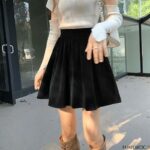 jupe noire plissée en velours